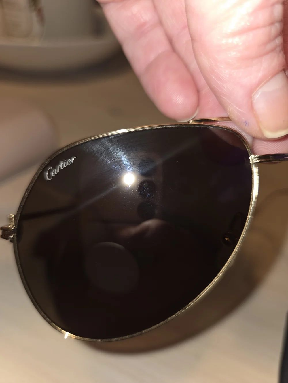 Cartier Gold Frame Sunglasses with Dark Gray Lenses
